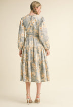 Lina midi Dress                                         

Vestido midi floral con ribete de volantes