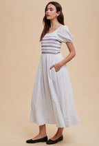 Smocked Maxi Dress
In Contrast