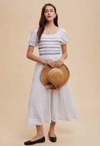 Smocked Maxi Dress
In Contrast