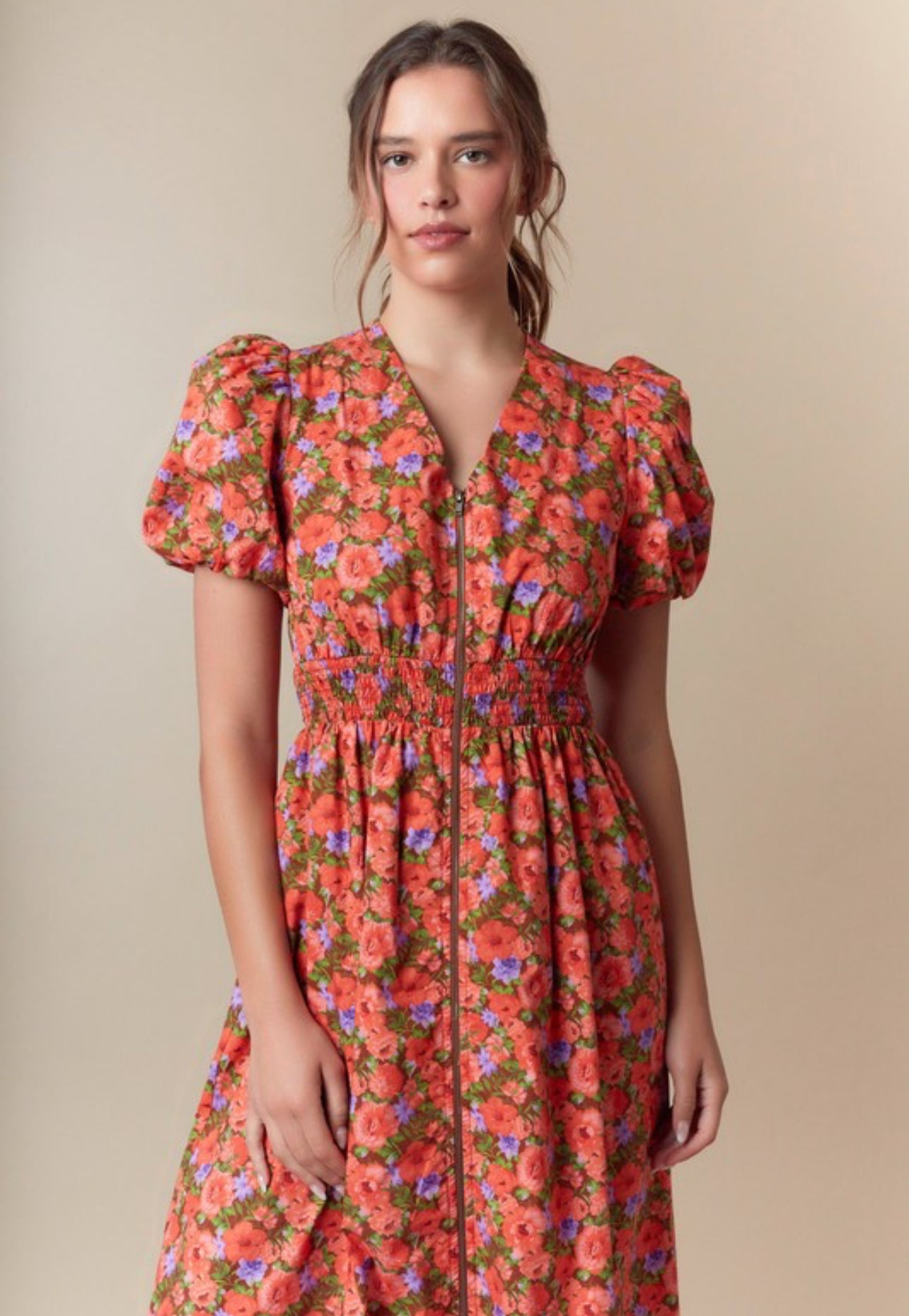 Ivonne midi Dress.                                       Vestido midi con cremallera frontal y estampado floral de transición