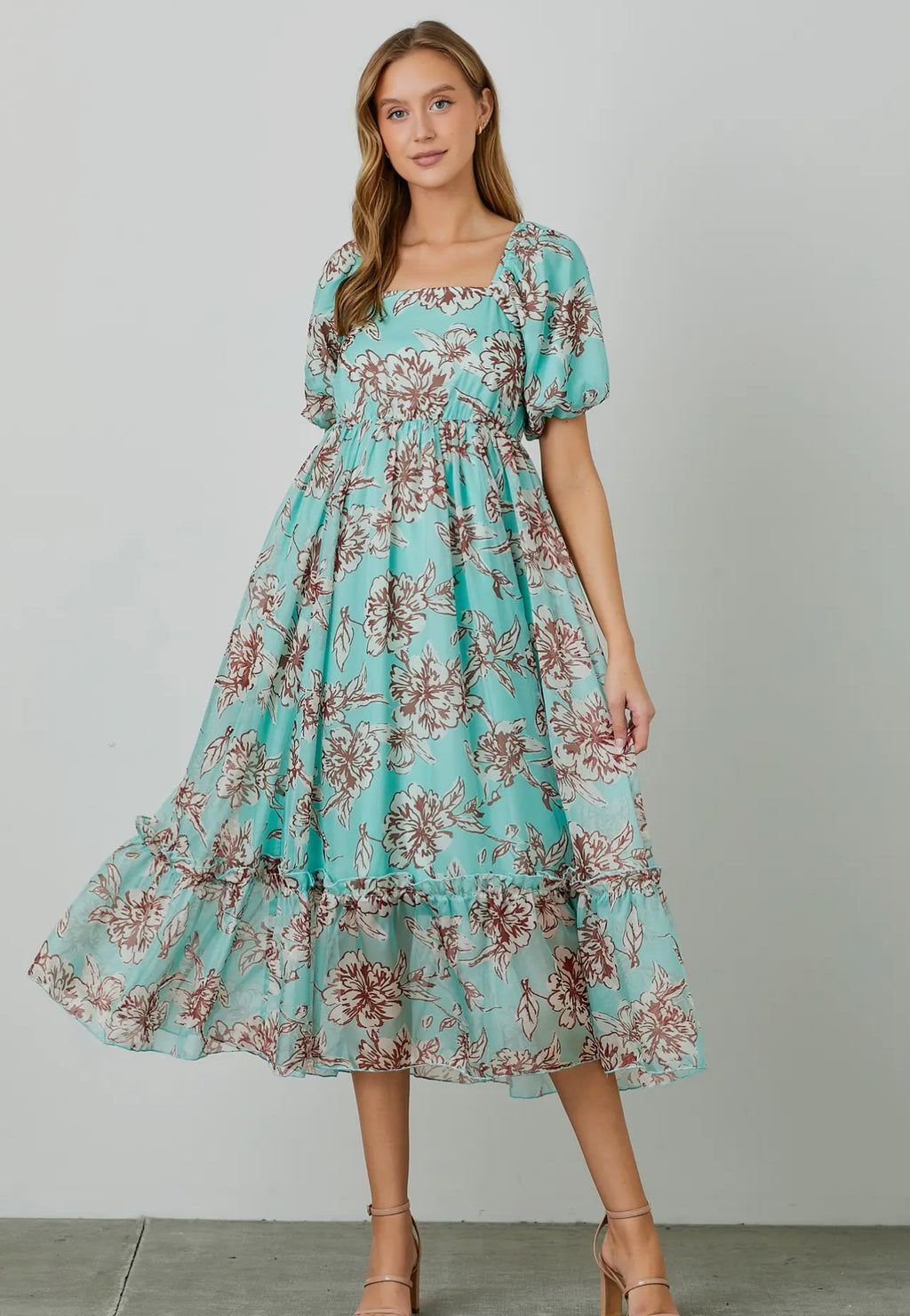 Cielo Dress                                               Vestido largo con manga de burbujas y estampado floral