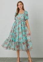 Cielo Dress                                               Vestido largo con manga de burbujas y estampado floral