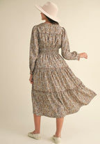 Helena Midi Dress.                                     Vestido midi floral con ribete en contraste