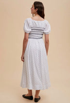 Smocked Maxi Dress
In Contrast